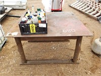 Welding table with spray cans
