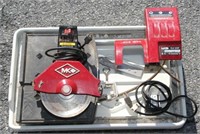MK Model MK-370 tile saw with pump, in working