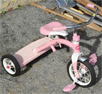 Pink Radio Flyer tricycle