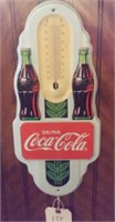 2 tin metal coca cola signs 1 is a thermometer