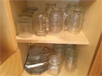 2 shelves assorted glassware mugs metal tray
