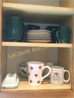 2 shelves mugs and coffee cups w saucers