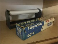old metal paper dispenser and reynolds foil