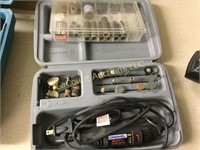 Dremel tool with accessory case of assorted