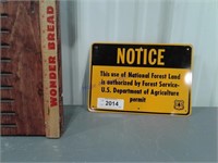 Notice National Forest Land tin sign, 10 x 7