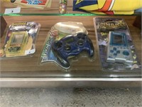 4 ELECTRONIC HAND HELD GAMES - STILL IN PACKAGE