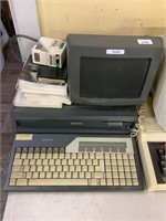 APRICOT COMPUTER WITH MONITOR AND BOOKLETS