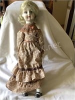 Antique Porcelain Face Doll with Cloth Body