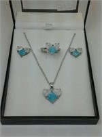 4 piece ring, necklace, earrings set. Sugg ret