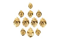 ELEVEN CHINESE GOLD PEACH PENDANTS