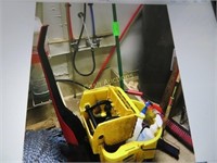 Mop bucket and cleaning supplies
