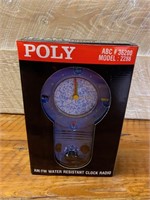 NOS Poly AM/FM Water Resistant Clock