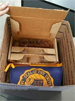Box of vintage flag and shot glasses