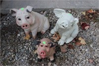3 plastic pig garden ornaments