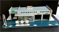 Vintage tin litho Automotive Center toy garage