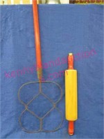 old red handle rug beater & rolling pin