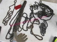 lot of 12 various chain saw chains in tin