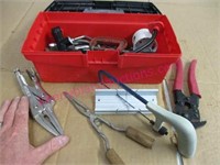 red tool box with various tools