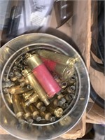 gun cleaning kits, some ammo, empty ammo cases