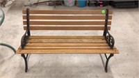 Small wood bench w/ cast iron frame. 26x48x14