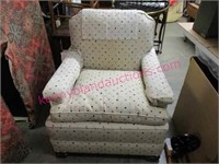 older light colored club chair (polka dots)