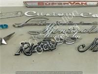 collection of vehicle name plates