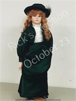 35" tall Porcelain doll w/ stand (green outfit)
