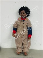 25" tall Porcelain doll in coveralls