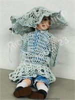 26" tall Porcelain doll ( blue crochet)