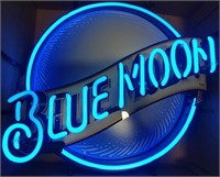 Blue moon neon beer advertisement