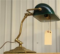 brass desk lamp with emerlite shade, base is