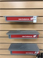 3 New Balance shoe display