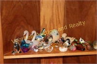 all figurines in 3 corner cabinet