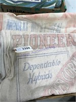 2 Pioneer seed corn sacks, Sargent & Co mineral