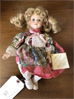 Bisque baby doll with soft body and certificate