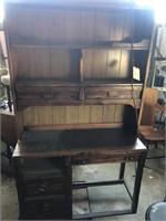 Vintage office desk with bookcase and light