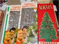 Three boxes of tinsel garland -one box icicles