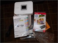 Canon Selphy CP750/CP740 small printer with guide