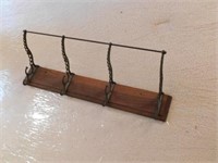 Vintage cast iron on wood coat hangers and hat