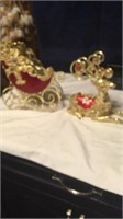 Painted cast-iron reindeer with Santa sleigh