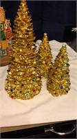 Set of three Gold foiled decorated Christmas trees