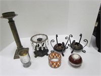 Large group of candleholders and candles