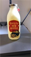 Saving for new wheels milk bottle bank
