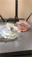 Two unmarked glass piggy banks