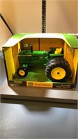 Ertl John Deere 410 wide front tractor dual back