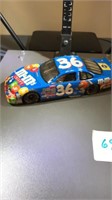 Metal M&M race car number 36 Pedegree series