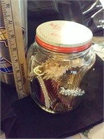 Old Morrell food or coffee jar full of combs