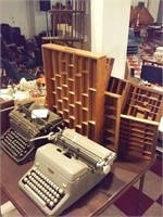 6 shadowboxes Royal & Underwood typewriters, shelf