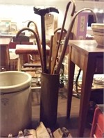 old brass umbrella stand w several vintage canes