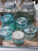 7 jars with lids
